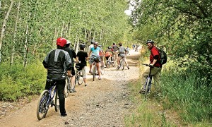 A bike group pauses for a moment along the Coal Mines Trail in the Cle Elum/Roslyn area off Interstate 90. Not overused but still a popular destination, this trail provides hikers, bikers and horseback riders a glimpse into the history of the region. (Ron Graham, Special to the YH-R)